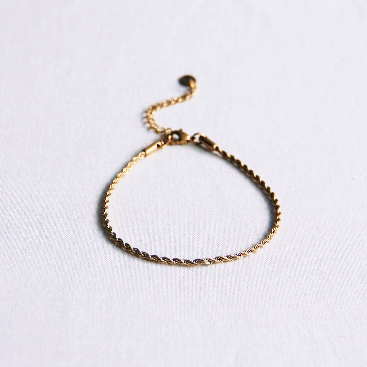 Steel "twisted" bracelet small – gold