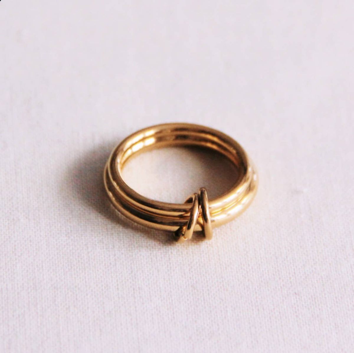 Double ring connected with rings - gold