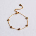 Stainless steel fine daisy flower bracelet - gold