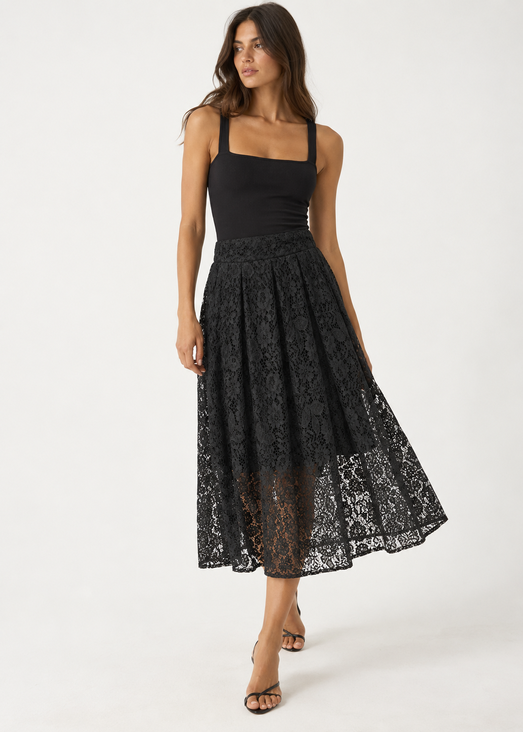 Black floral lace midi skirt shown from the front against a white background