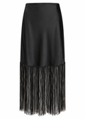 Model wearing a black midi skirt with a long fringe hem