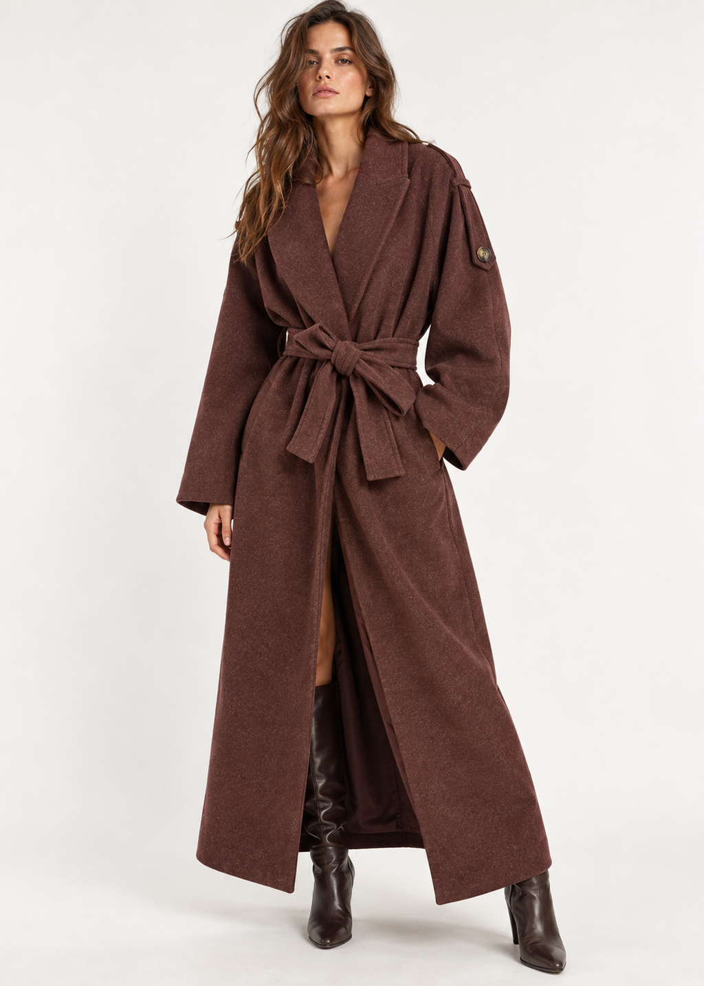 Model wearing a chocolate brown belted wrap coat with tall boots