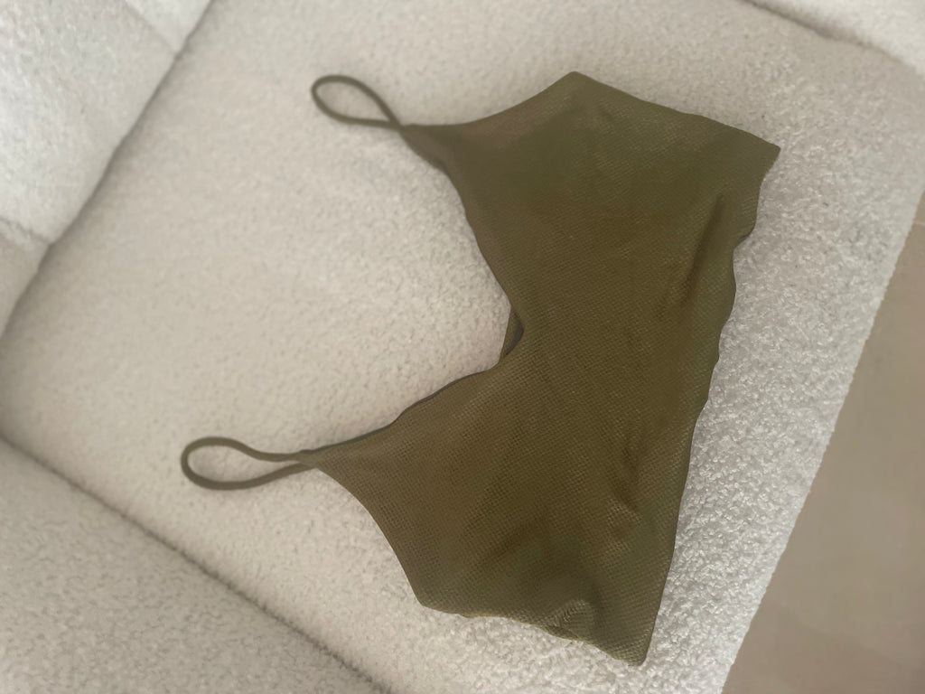 bralette on a beige couch