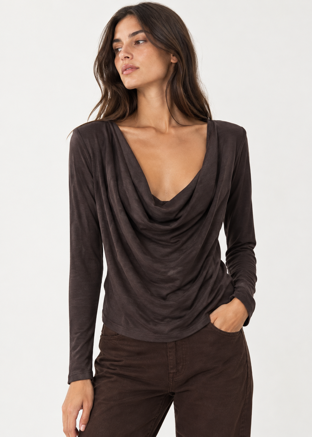 Dark charcoal cowl-neck top styled on a model with dark trousers