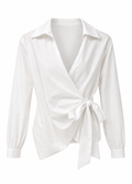 White collared wrap blouse with a side bow tie and long cuffed sleeves, front view