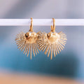 Stainless steel hoop earrings with heart with rays - gold