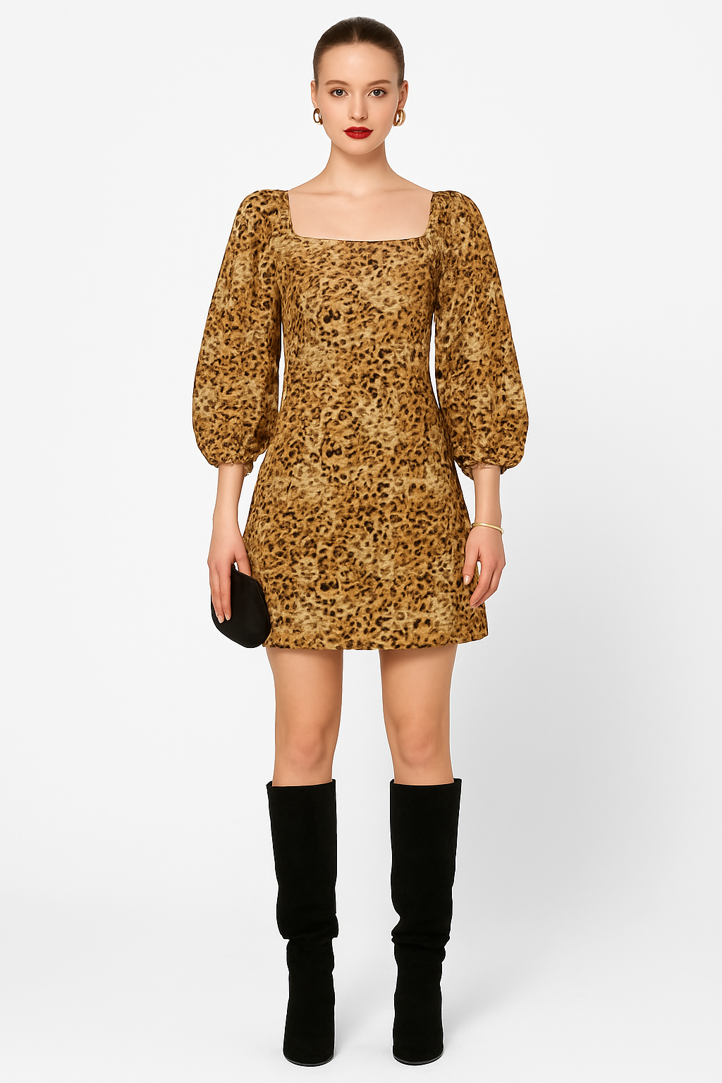 Woman wearing a leopard print dress with puff sleeves and black knee-high boots on a white background