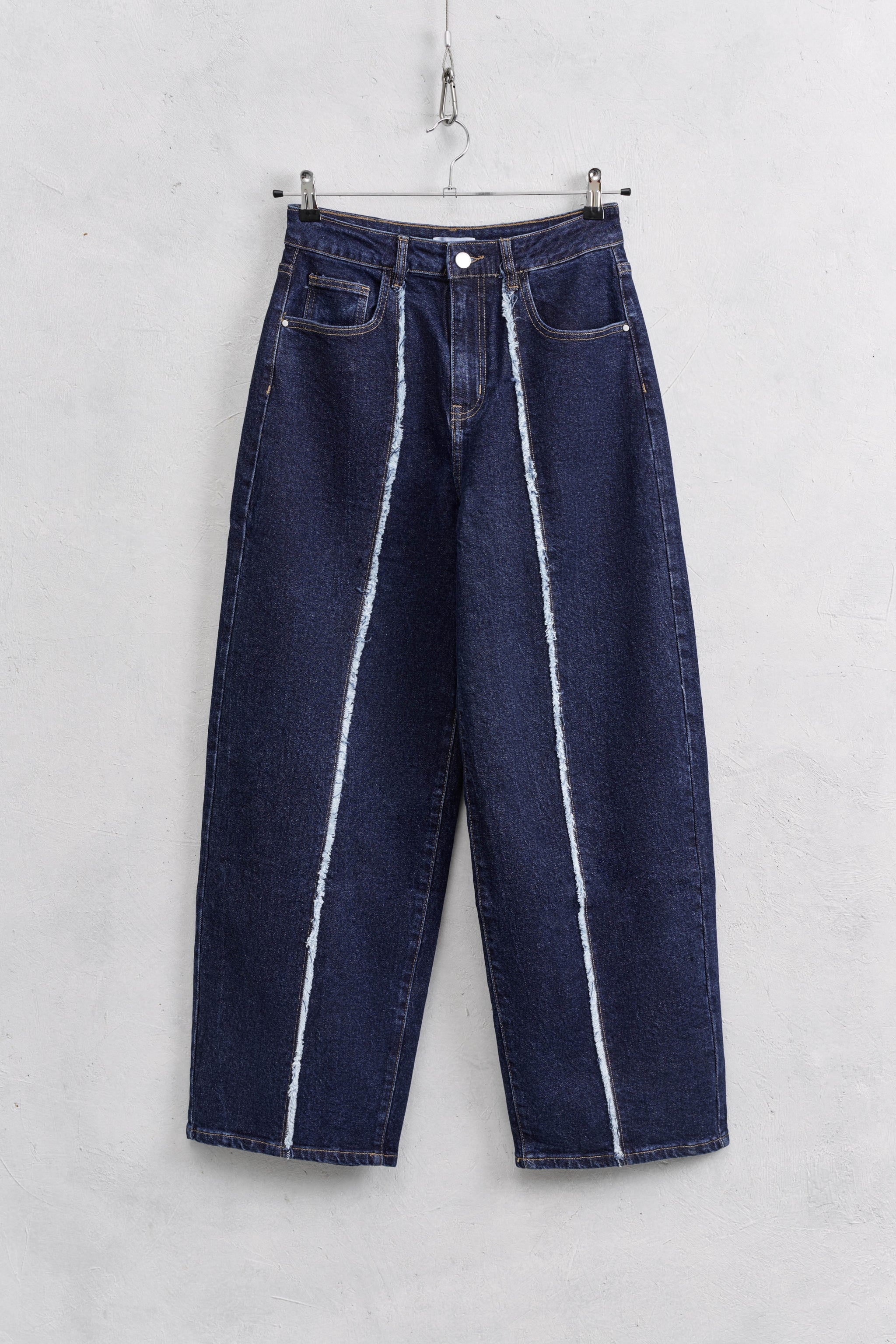 Frayed seam blue denim jeans